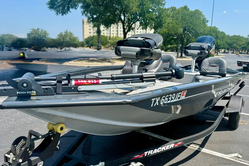 Slide: The Image of 2021 Tracker Pro Team 175 TF fishing boat on trailer in parking lot. - 5
