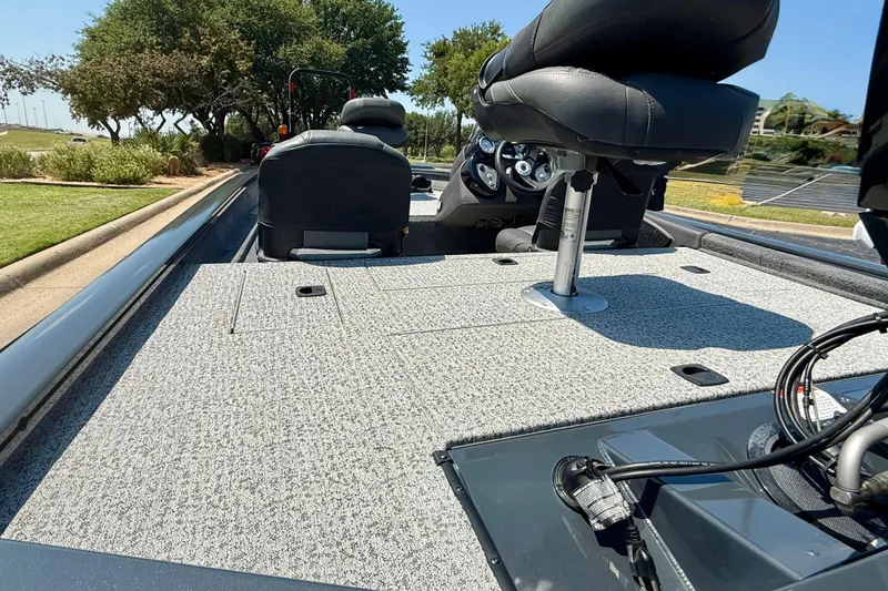 Slide: The Image of 2021 Tracker Pro Team 175 TF boat interior with seating and control panel. - 9