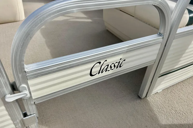 Slide: The Image of 2010 Sun Tracker Party Barge 20 Classic Series gate detail with "Classic" text. - 35