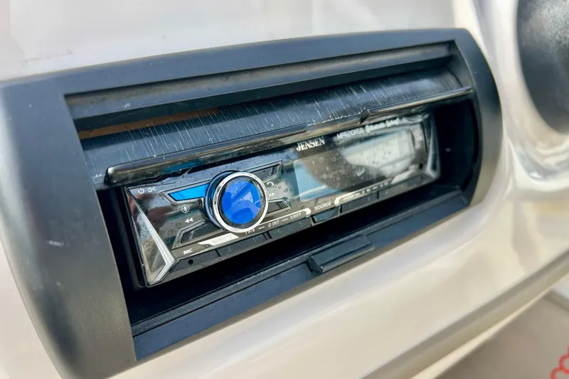 Slide: The Image of Close-up of a Jensen stereo system on a 2010 Sun Tracker Party Barge 20 Classic Series. - 29