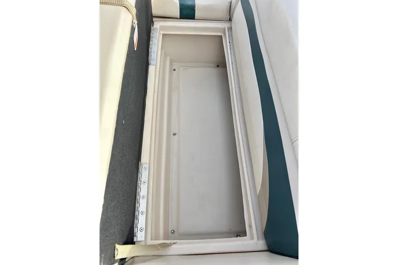 Slide: The Image of Storage compartment on a 2010 Sun Tracker Party Barge 20 Classic Series boat. - 24