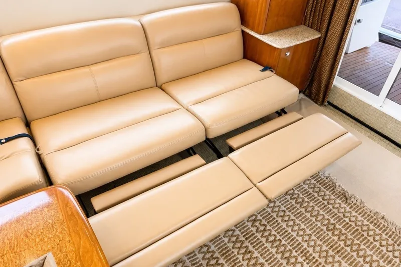 Slide: The Image of Luxurious beige leather seating in 2007 Meridian 341 Sedan yacht interior. - 8