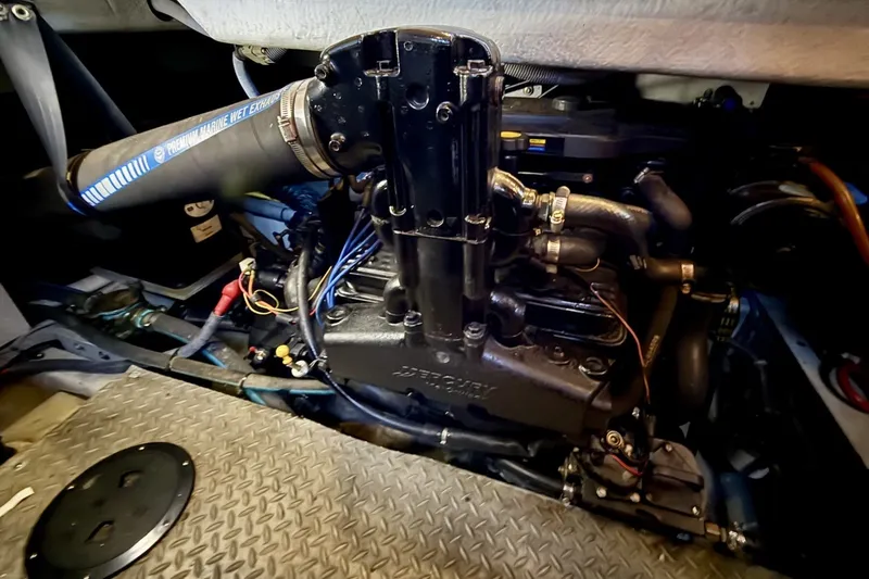 Slide: The Image of Engine compartment of a 2007 Meridian 341 Sedan boat, featuring premium marine components. - 24