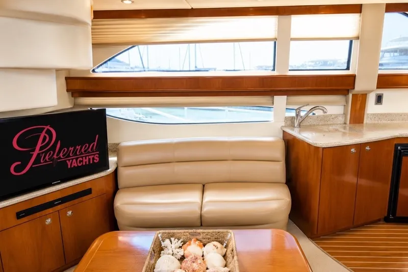 Slide: The Image of Luxurious interior of a 2007 Meridian 341 Sedan yacht with leather seating and modern amenities. - 6