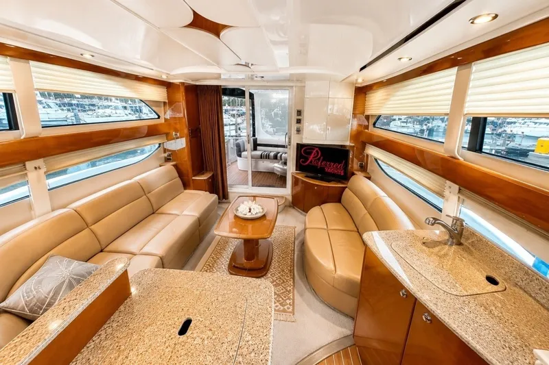 Slide: The Image of Luxurious interior of a 2007 Meridian 341 Sedan yacht with plush seating and elegant finishes. - 4