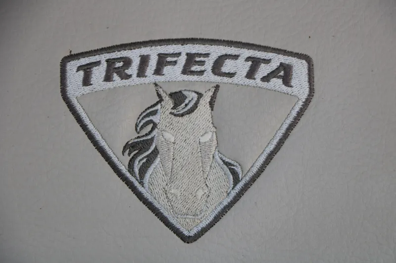 Slide: The Image of Embroidered Trifecta logo featuring a horse on a 2019 Trifecta 23RF SS Arch. - 40