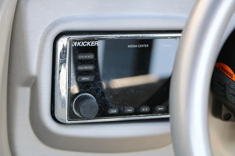 Slide: The Image of Kicker media center in 2019 Trifecta 23RF SS Arch boat dashboard. - 35