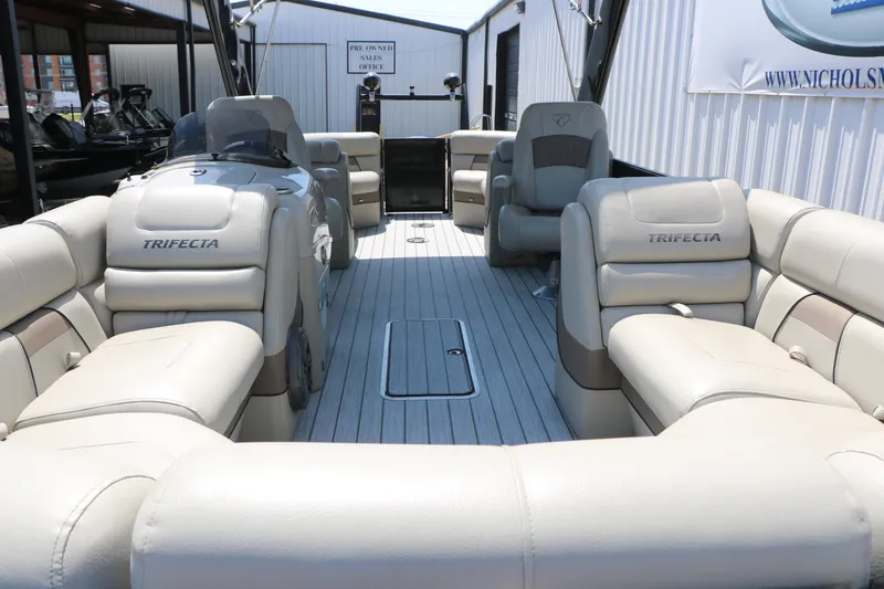 Slide: The Image of 2019 Trifecta 23RF SS Arch pontoon boat with spacious seating and modern design. - 17