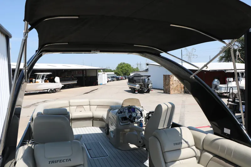 Slide: The Image of 2019 Trifecta 23RF SS Arch pontoon boat with spacious seating and sleek design. - 25
