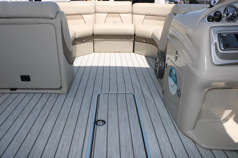 Slide: The Image of Interior of 2019 Trifecta 23RF SS Arch boat with beige seating and striped flooring. - 41