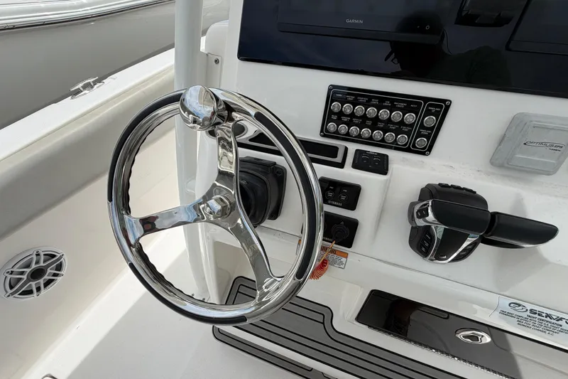 Slide: The Image of Steering console of 2022 Sea Fox 288 Commander boat with controls and display. - 22