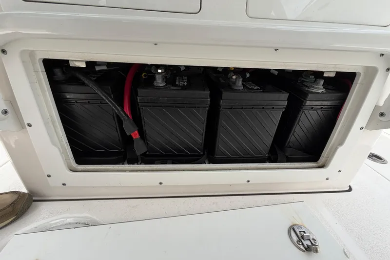 Slide: The Image of Battery compartment of a 2022 Sea Fox 288 Commander boat, showing multiple batteries. - 25