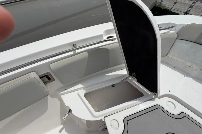 Slide: The Image of 2022 Sea Fox 288 Commander boat storage compartment open, showcasing interior space. - 35