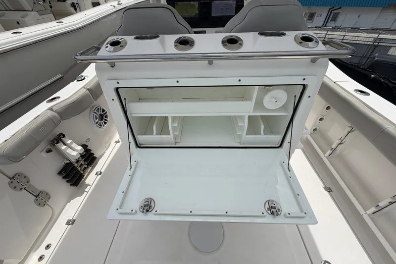 Slide: The Image of 2022 Sea Fox 288 Commander boat interior with open storage compartment and seating. - 26