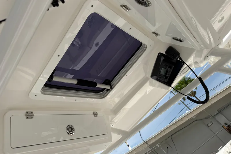 Slide: The Image of 2022 Sea Fox 288 Commander boat interior with hatch and radio equipment. - 17
