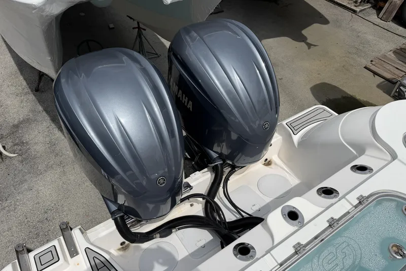 Slide: The Image of Twin Yamaha outboard engines on a 2022 Sea Fox 288 Commander boat. - 12
