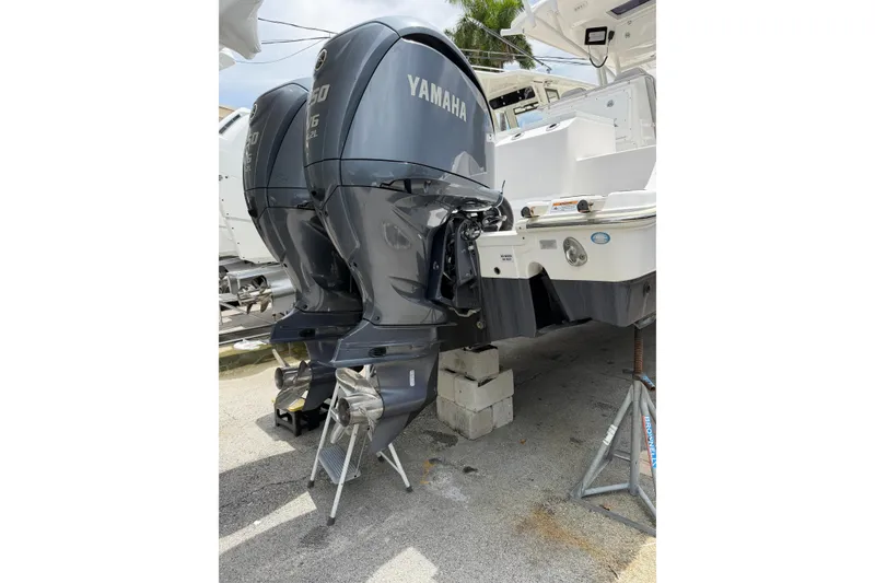 Slide: The Image of 2022 Sea Fox 288 Commander with twin Yamaha outboard engines on display. - 8