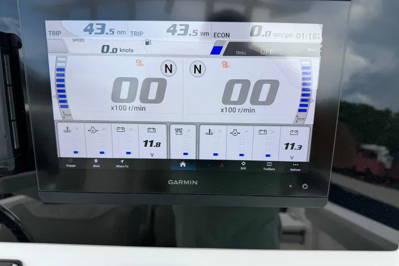 Slide: The Image of Garmin display on 2022 Sea Fox 288 Commander showing trip data and engine metrics. - 44