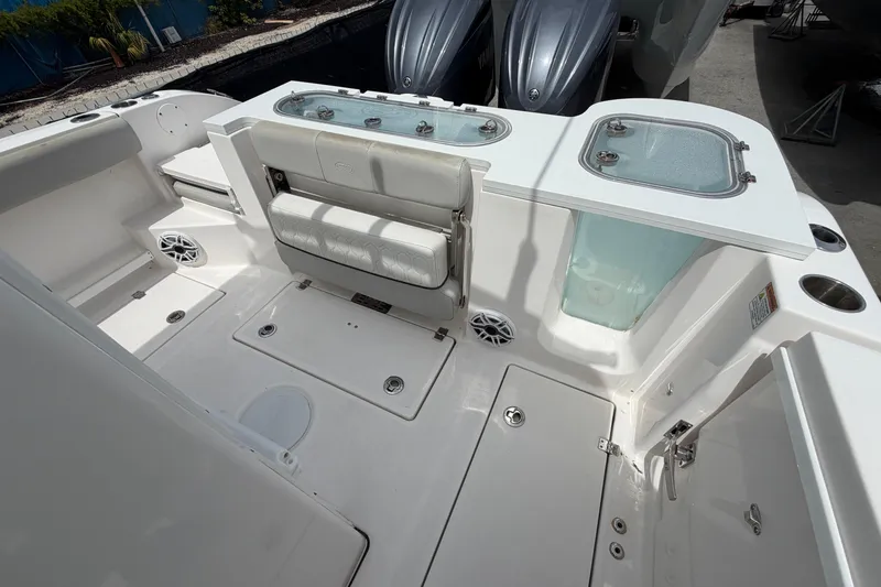 Slide: The Image of 2022 Sea Fox 288 Commander boat interior with seating and storage compartments. - 32