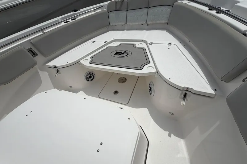 Slide: The Image of 2022 Sea Fox 288 Commander boat interior with seating and storage compartments. - 34