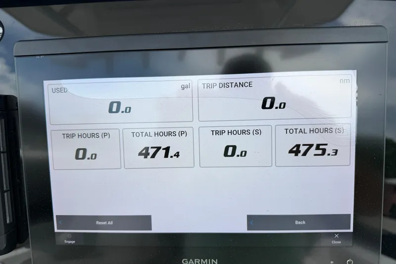 Slide: The Image of Garmin display on 2022 Sea Fox 288 Commander showing trip and total hours. - 45