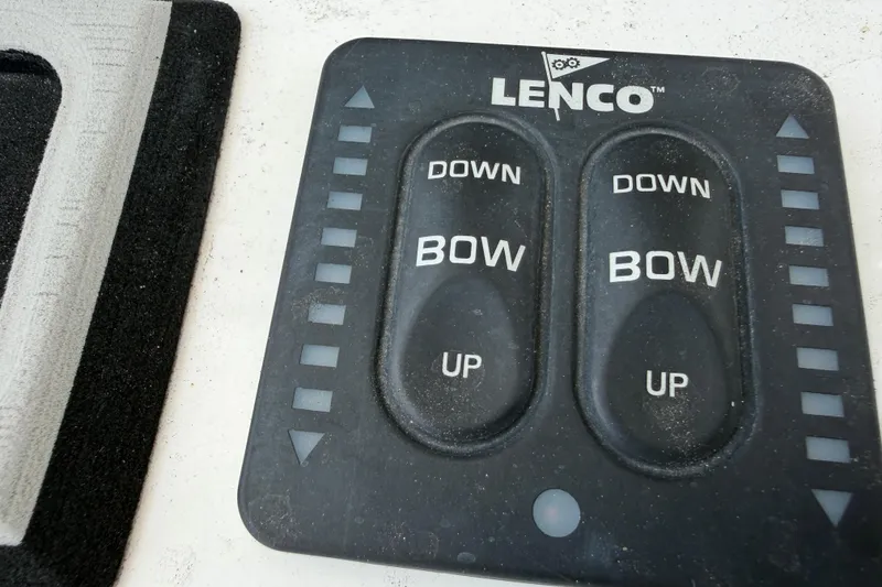 Slide: The Image of Close-up of a Lenco control panel with buttons for "Bow Up" and "Bow Down." - 13