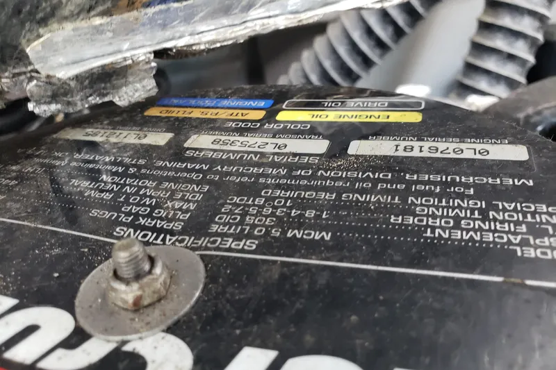 Slide: The Image of Close-up of a 1998 Chaparral 2130 SS engine serial number and specifications label. - 18