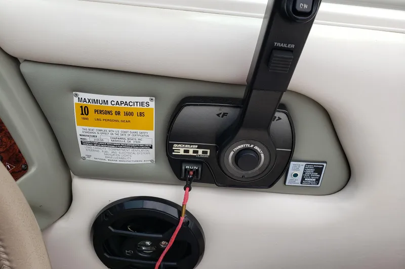 Slide: The Image of Control panel of a 1998 Chaparral 2130 SS boat with capacity label. - 11