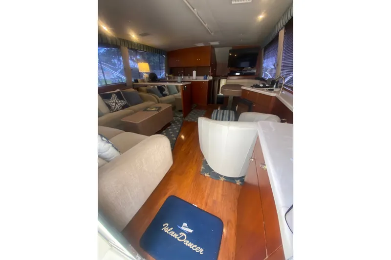 Slide: The Image of Luxurious interior of a 1996 Ocean Super Sport yacht with elegant furnishings. - 6