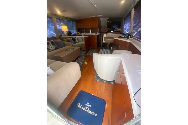 Slide: The Image of Luxurious interior of a 1996 Ocean Super Sport yacht with elegant seating and decor. - 7