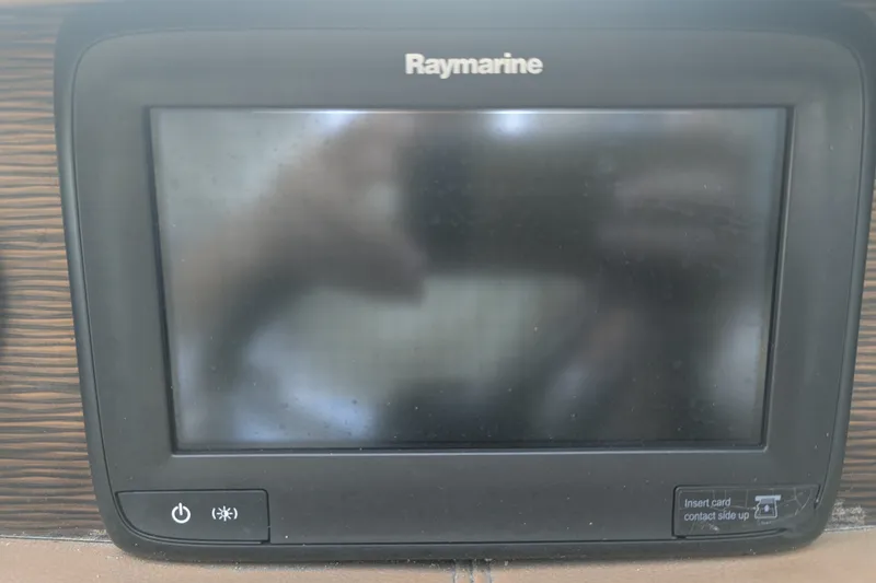 Slide: The Image of Raymarine display screen on 2017 Four Winns HD240 boat dashboard. - 15