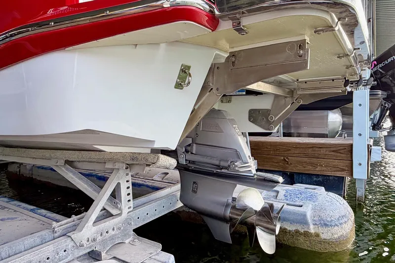 Slide: The Image of 2017 Cobalt A25 boat on trailer, showcasing propeller and stern details. - 31