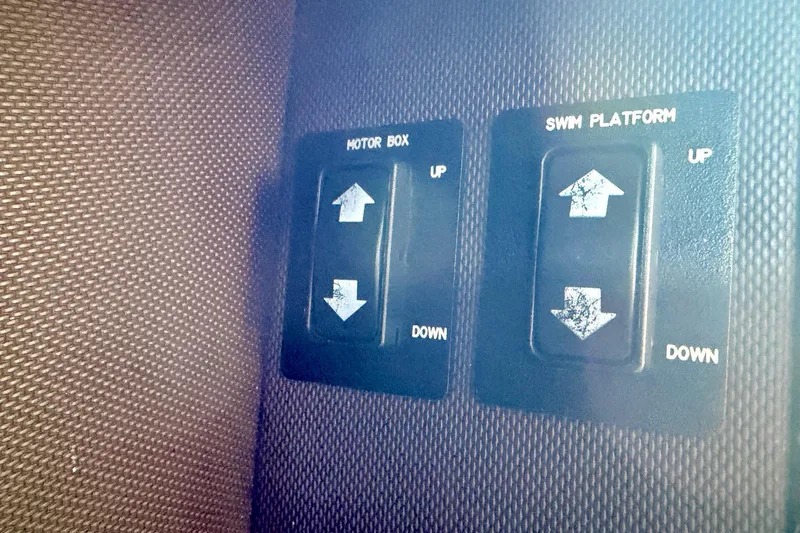 Slide: The Image of Switches for motor box and swim platform on 2017 Cobalt A25 boat. - 35