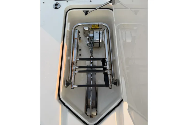 Slide: The Image of Anchor storage compartment on a 2018 Scout 275 Dorado boat. - 25