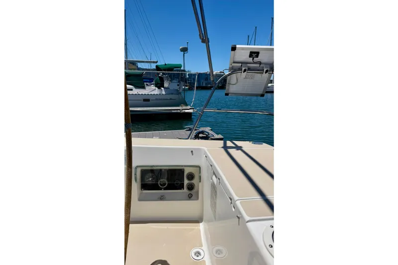 Slide: The Image of 2001 J Boats J/32 sailboat cockpit with marina view in background. - 53