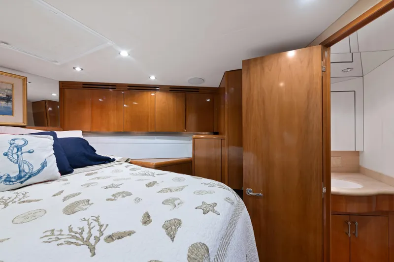 Slide: The Image of Luxurious cabin interior of 2003 Hatteras 60 Convertible yacht with nautical decor. - 39