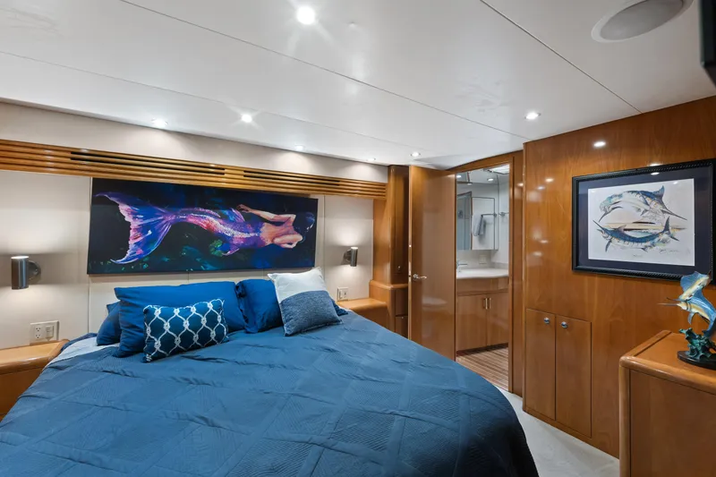 Slide: The Image of Luxurious cabin interior of 2003 Hatteras 60 Convertible yacht with marine-themed decor. - 29