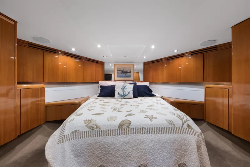 Slide: The Image of Luxurious cabin interior of 2003 Hatteras 60 Convertible yacht with elegant wood cabinetry. - 37