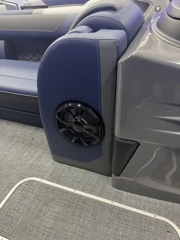 Slide: The Image of A modern boat with gray and blue interior and a built-in speaker. - 8