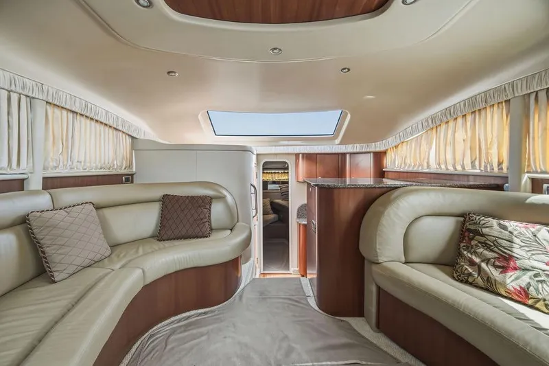 Slide: The Image of Luxurious interior of a 2006 Sea Ray 40 Motor Yacht with elegant seating and decor. - 13