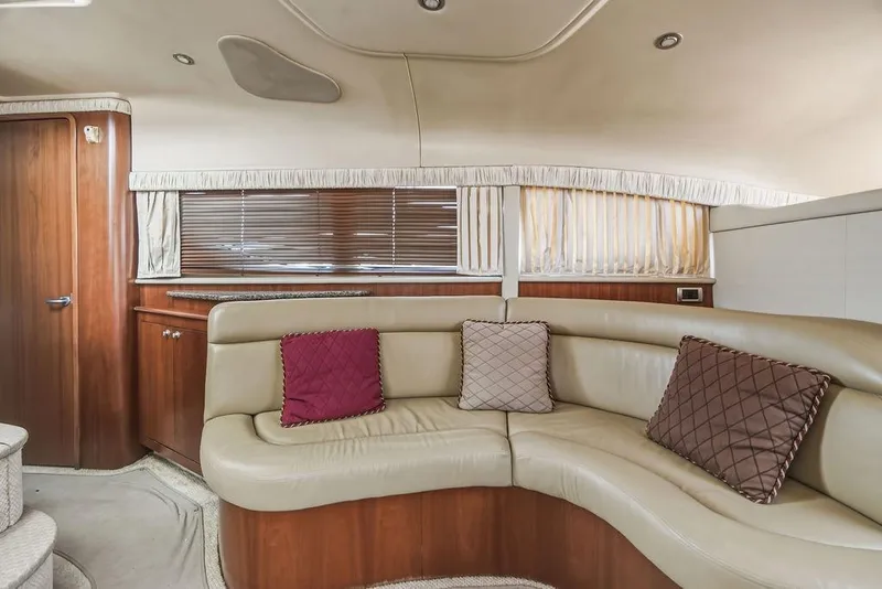 Slide: The Image of Luxurious interior of 2006 Sea Ray 40 Motor Yacht with plush seating and elegant decor. - 14