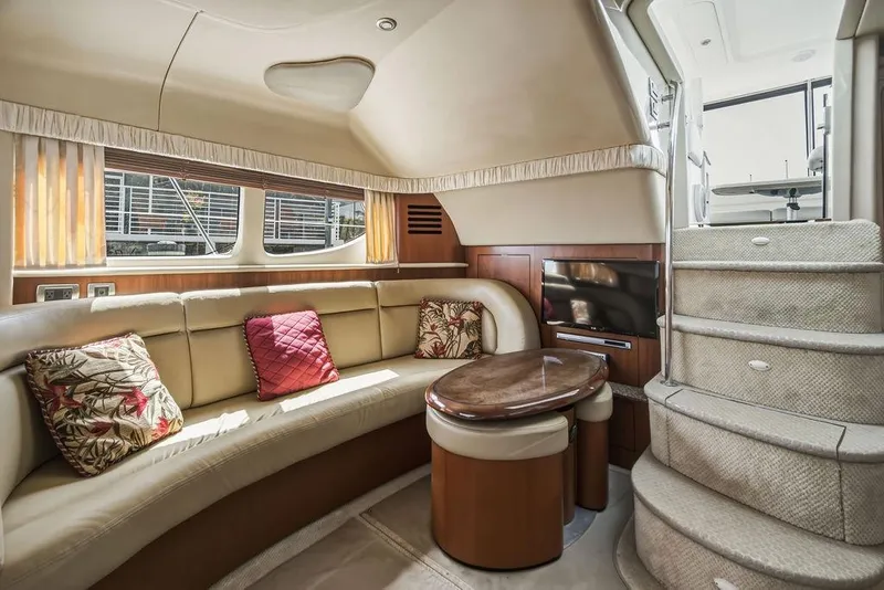 Slide: The Image of Luxurious interior of 2006 Sea Ray 40 Motor Yacht with plush seating and elegant decor. - 15