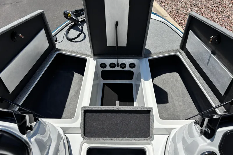 Slide: The Image of 2027 Nitro Z17 boat storage compartments open, showcasing spacious interior design. - 5