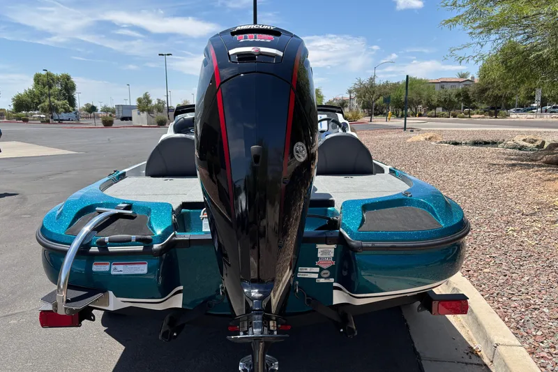 Slide: The Image of 2027 Nitro Z17 boat with Mercury engine, parked outdoors on a sunny day. - 3