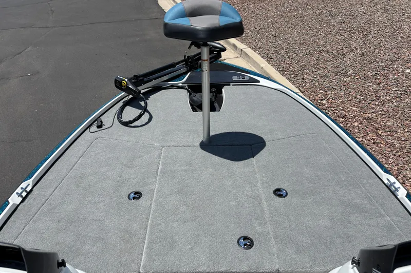Slide: The Image of Front deck of a 2027 Nitro Z17 boat with a fishing seat and trolling motor. - 4