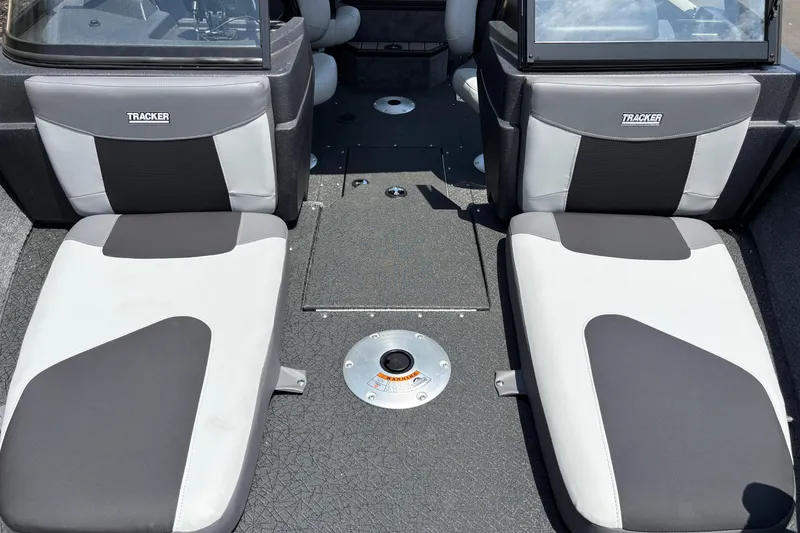 Slide: The Image of Interior of 2027 Tracker Pro Guide V-175 Combo boat with cushioned seating. - 12