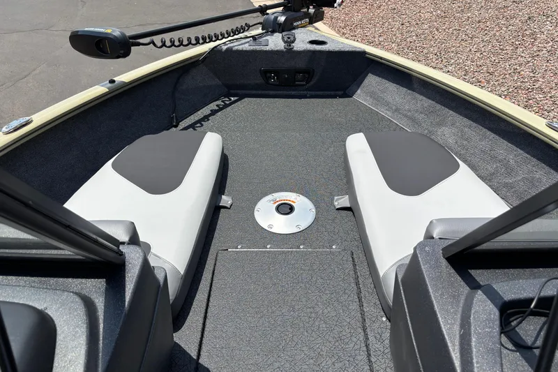 Slide: The Image of 2027 Tracker Pro Guide V-175 Combo boat interior with seating and trolling motor. - 11