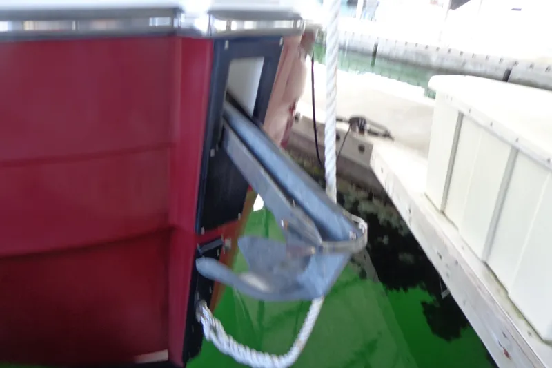Slide: The Image of 2016 Ranger Tugs R-31 S boat with anchor at dockside. - 45