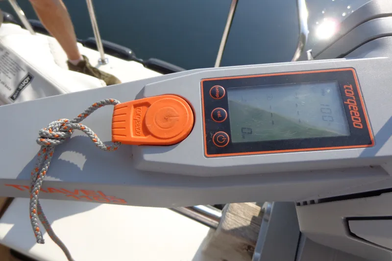 Slide: The Image of Torqeedo motor control on 2016 Ranger Tugs R-31 S boat, featuring digital display and safety key. - 64