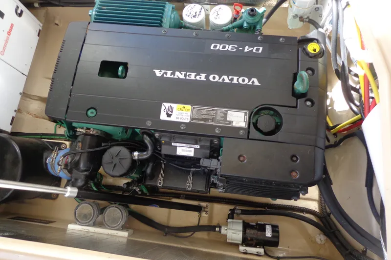 Slide: The Image of Volvo Penta engine in 2016 Ranger Tugs R-31 S boat, showcasing mechanical components. - 48